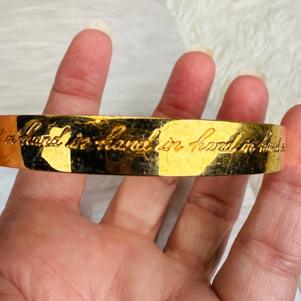 Kate Spade “Hand and Hand” inscribed Goldtone Bangle Bracelet - Picture 14 of 15
